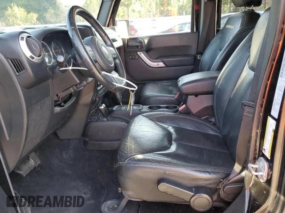 2015 Jeep Wrangler Unlimited Sahara with VIN 1C4HJWEGXFL744852, listed as a Copart auction lot 60246145 with 135,496 mi miles and Salvage title. Bid and sale history available at DreamBid. Image 7.