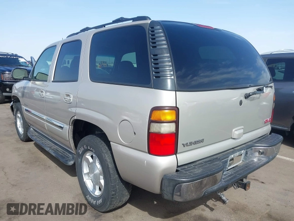 2004 GMC Yukon SLT with VIN 1GKEK13Z54R144181, listed as a IAAI auction lot 41702834 with 146,827 mi miles. Bid and sale history available at carsss.com. Image 3.