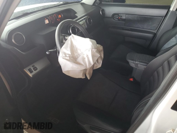 2012 Scion xB with VIN JTLZE4FE2CJ028761, listed as a Copart auction lot 53379165 with 131,758 mi miles and Salvage Title. Bid and sale history available at DreamBid. Image 7.