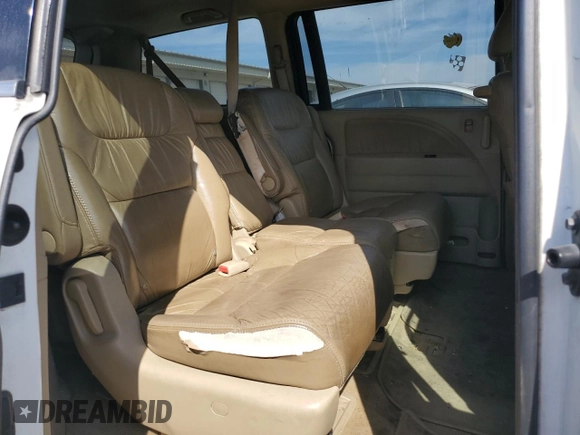 2010 Honda Odyssey EX-L with VIN 5FNRL3H77AB051869, listed as a Copart auction lot 48473815 with 248,511 mi miles and Salvage Title. Bid and sale history available at DreamBid. Image 11.