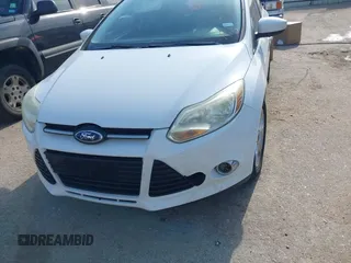 2012 Ford Focus SE with VIN 1FAHP3K21CL226992, listed as a IAAI auction lot 42036724 with 156,786 mi miles and . Bid and sale history available at carsss.com. Image 6.