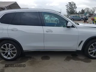 2021 BMW X5 xDrive40i with VIN 5UXCR6C03M9G36156, listed as a IAAI auction lot 42125009 with 30,877 mi miles. Bid and sale history available at carsss.com. Image 13.