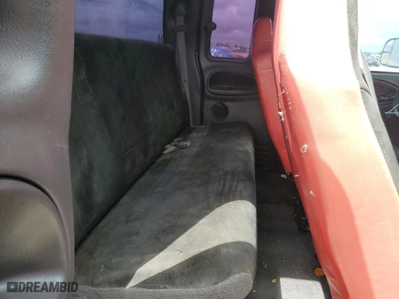 2000 Dodge Ram 1500 with VIN 1B7HC13YXYJ173323, listed as a Copart auction lot 69969774 with 425,918 mi miles and Salvage Title. Bid and sale history available at carsss.com. Image 10.