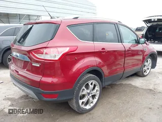 2015 Ford Escape Titanium with VIN 1FMCU0J98FUC07196, listed as a IAAI auction lot 41930660 with 51,161 mi miles and . Bid and sale history available at DreamBid. Image 4.