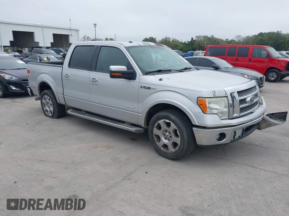2012 Ford F-150 XL with VIN 1FTFW1CT2CKD51232, listed as a IAAI auction lot 41497343 with 300,216 mi miles. Bid and sale history available at carsss.com. Image 1.
