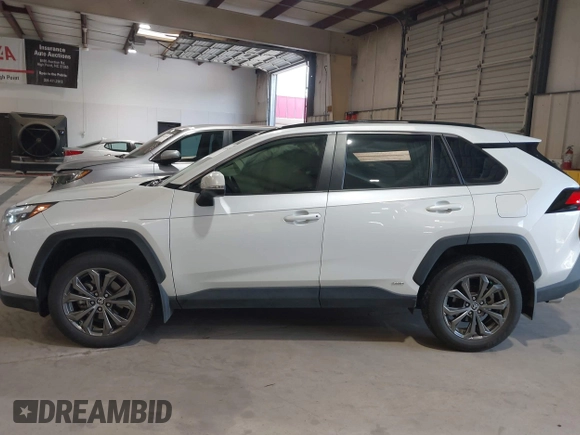2023 Toyota RAV4 Hybrid XLE Premium with VIN JTMB6RFV2PD089104, listed as a IAAI auction lot 42645439 with 43,535 mi miles and . Bid and sale history available at DreamBid. Image 14.
