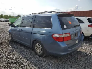 2005 Honda Odyssey EX-L z VIN 5FNRL38685B092279, wystawiony jako Copart lot #57452175 z przebiegiem Nie podano mil oraz Szkoda całkowita • Salvage title. Historia ofert i sprzedaży dostępna na DreamBid. Obrazek 2.