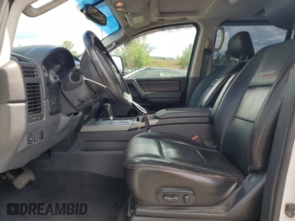 2012 Nissan Titan SV z VIN 1N6BA0EC2CN309207, wystawiony jako Copart lot #60451435 z przebiegiem 124 900 mil mil oraz Szkoda całkowita • Salvage title. Historia ofert i sprzedaży dostępna na DreamBid. Obrazek 7.