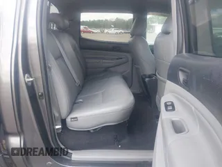 2014 Toyota Tacoma with VIN 5TFLU4EN9EX099414, listed as a IAAI auction lot 40528514 with 122,827 mi miles. Bid and sale history available at carsss.com. Image 8.