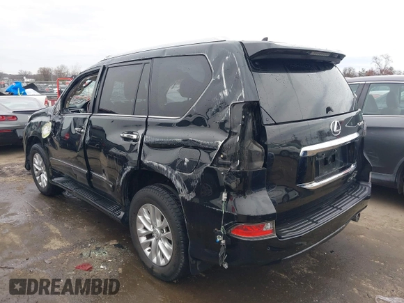 2014 Lexus GX 460 with VIN JTJBM7FX6E5073973, listed as a IAAI auction lot 41610332 with 128,870 mi miles. Bid and sale history available at carsss.com. Image 18.