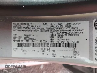 2014 Ford Fiesta SE with VIN 3FADP4EJ0EM215958, listed as a IAAI auction lot 42001168 with 115,231 mi miles and . Bid and sale history available at DreamBid. Image 9.
