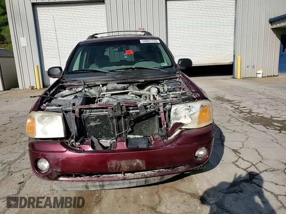 2003 GMC Envoy SLT z VIN 1GKET16S136186780, wystawiony jako Copart lot #55927155 z przebiegiem 163 099 mil mil oraz Szkoda całkowita • Salvage title. Historia ofert i sprzedaży dostępna na DreamBid. Obrazek 14.