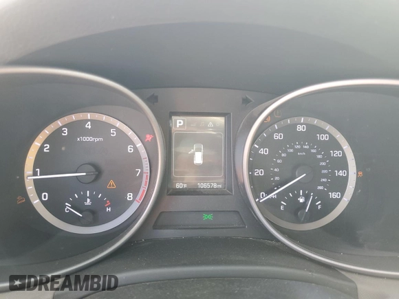 2018 Hyundai Santa Fe 2.4L z VIN 5XYZTDLB7JG572441, wystawiony jako Copart lot #52810145 z przebiegiem 106 578 mil mil oraz Szkoda całkowita • Salvage title. Historia ofert i sprzedaży dostępna na DreamBid. Obrazek 9.
