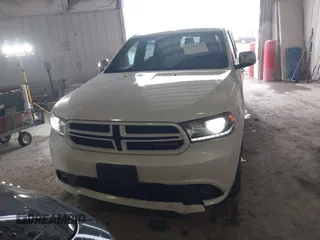 2016 Dodge Durango R/T with VIN 1C4SDJCT0GC419015, listed as a IAAI auction lot 41712230 with 159,523 mi miles and . Bid and sale history available at DreamBid. Image 12.