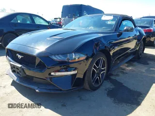 2019 Ford Mustang GT Premium z VIN 1FATP8FF5K5193437, wystawiony jako IAAI lot #42608815 z przebiegiem 67 115 mil mil oraz . Historia ofert i sprzedaży dostępna na DreamBid. Obrazek 21.