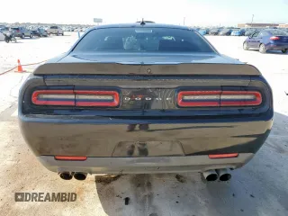 2015 Dodge Challenger SXT Plus z VIN 2C3CDZBG2FH723521, wystawiony jako Copart lot #52642195 z przebiegiem 145 834 mil mil oraz Szkoda całkowita • Salvage title. Historia ofert i sprzedaży dostępna na DreamBid. Obrazek 6.