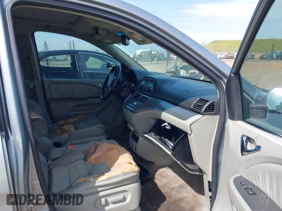 2009 Honda Odyssey EX-L with VIN 5FNRL387X9B055362, listed as a IAAI auction lot 42051881 with 139,172 mi miles and . Bid and sale history available at DreamBid. Image 5.