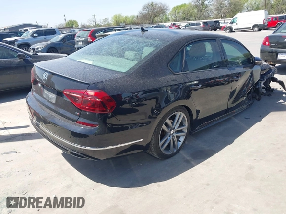2018 Volkswagen Passat 2.0T S with VIN 1VWAA7A31JC015784, listed as a IAAI auction lot 41829586 with 72,437 mi miles. Bid and sale history available at carsss.com. Image 4.