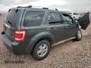 2009 Ford Escape Limited with VIN 1FMCU94769KC21080, listed as a Copart auction lot 65809795 with 171,483 mi miles and Salvage title. Bid and sale history available at DreamBid. Image 3.