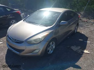 2012 Hyundai Elantra GLS PZEV with VIN 5NPDH4AE0CH091998, listed as a IAAI auction lot 42056779 with 206,425 mi miles. Bid and sale history available at carsss.com. Image 2.