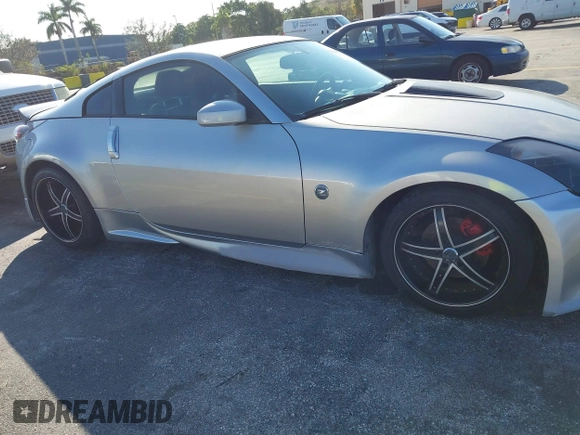 2003 Nissan 350Z Touring z VIN JN1AZ34E23T019866, wystawiony jako IAAI lot #41293510 z przebiegiem 118 416 mil mil oraz . Historia ofert i sprzedaży dostępna na DreamBid. Obrazek 6.