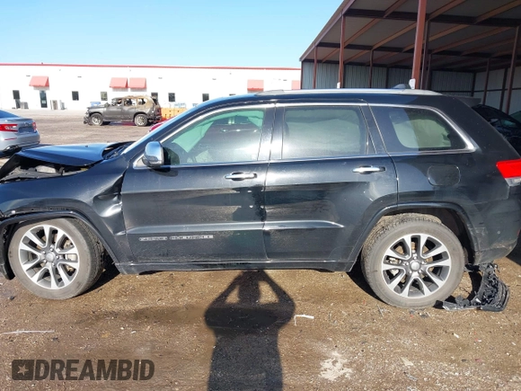 2018 Jeep Grand Cherokee High Altitude with VIN 1C4RJFCT3JC184895, listed as a IAAI auction lot 42093537 with 97,088 mi miles and . Bid and sale history available at DreamBid. Image 14.