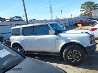 2023 Ford Bronco with VIN 1FMEE5DP0PLC16138, listed as a IAAI auction lot 41310455 with 25,963 mi miles. Bid and sale history available at carsss.com. Image 12.