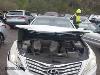 2013 Hyundai Azera with VIN KMHFH4JG0DA216691, listed as a IAAI auction lot 41704694 with 200,228 mi miles and . Bid and sale history available at DreamBid. Image 10.