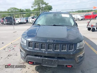 2017 Jeep Compass Trailhawk z VIN 3C4NJDDB6HT631047, wystawiony jako IAAI lot #42457508 z przebiegiem 59 414 mil mil oraz . Historia ofert i sprzedaży dostępna na DreamBid. Obrazek 12.
