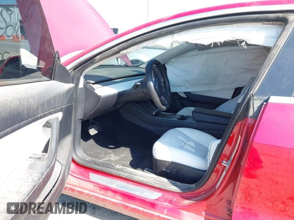 2020 Tesla Model 3 Long Range with VIN 5YJ3E1EB5LF783269, listed as a IAAI auction lot 42085024 with 80,939 mi miles. Bid and sale history available at carsss.com. Image 5.