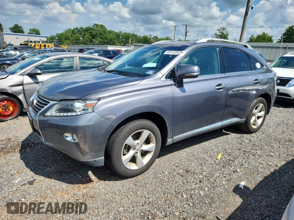 2015 Lexus RX 350 with VIN 2T2BK1BA5FC323033, listed as a Copart auction lot 64133545 with 132,719 mi miles and Salvage title. Bid and sale history available at DreamBid. Image 1.
