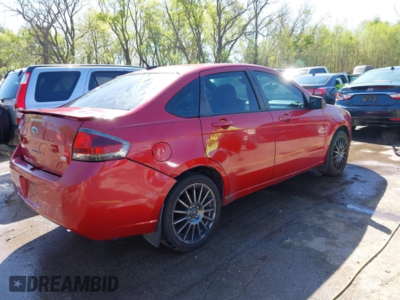 2010 Ford Focus SES with VIN 1FAHP3GN9AW156110, listed as a IAAI auction lot 42008652 with 203,931 mi miles. Bid and sale history available at carsss.com. Image 4.
