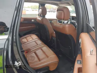 2015 Jeep Grand Cherokee Summit z VIN 1C4RJFJT0FC674494, wystawiony jako IAAI lot #42056835 z przebiegiem 143 969 mil mil oraz . Historia ofert i sprzedaży dostępna na DreamBid. Obrazek 8.
