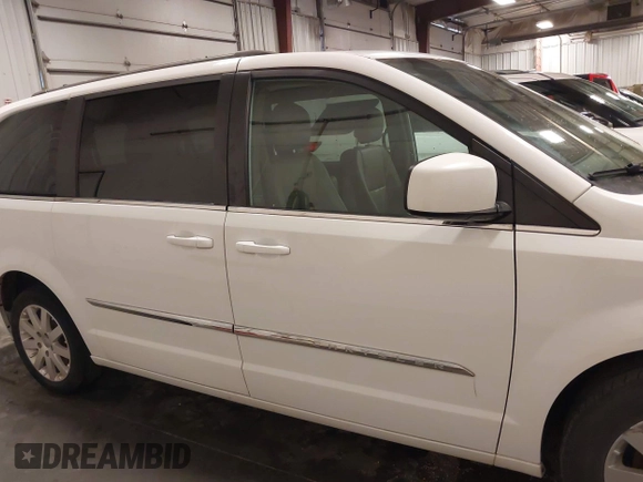 2015 Chrysler Town & Country Touring with VIN 2C4RC1BG9FR626482, listed as a IAAI auction lot 41879865 with 129,694 mi miles and . Bid and sale history available at DreamBid. Image 14.