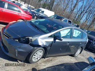 2014 Toyota Prius Two z VIN JTDZN3EU2E3293170, wystawiony jako IAAI lot #41721493 z przebiegiem 186 801 mil mil oraz . Historia ofert i sprzedaży dostępna na DreamBid. Obrazek 14.