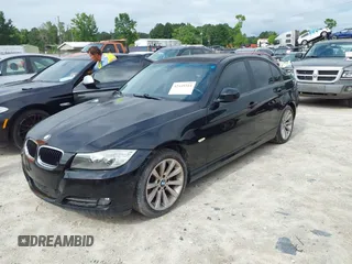 2009 BMW 3 Series 328i with VIN WBAPH775X9NM27054, listed as a IAAI auction lot 42449314 with 169,657 mi miles and . Bid and sale history available at DreamBid. Image 2.