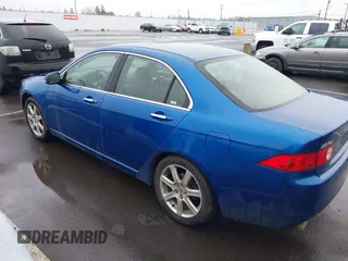 2004 Acura TSX w/Navigation with VIN JH4CL96914C021165, listed as a IAAI auction lot 41767323 with 144,071 mi miles. Bid and sale history available at carsss.com. Image 3.