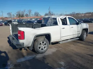 2014 GMC Sierra 1500 SLT with VIN 1GTV2VEC0EZ182222, listed as a IAAI auction lot 41639510 with 87,154 mi miles. Bid and sale history available at carsss.com. Image 4.