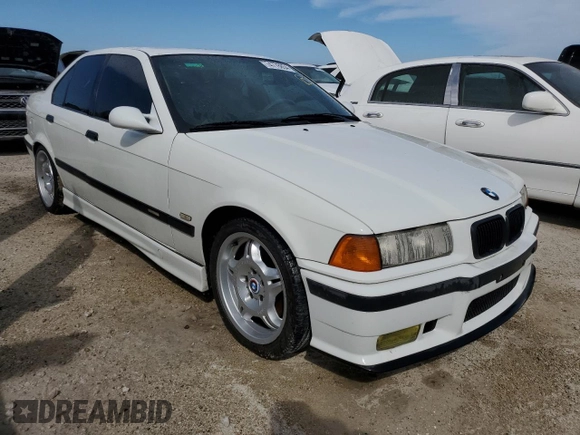 1997 BMW M3 with VIN WBSCD9324VEE06968, listed as a Copart auction lot 74778854 with Not provided miles and Salvage title. Bid and sale history available at DreamBid. Image 4.