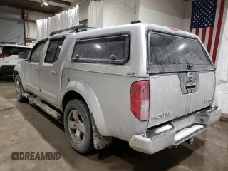 2006 Nissan Frontier LE with VIN 1N6AD07W96C436210, listed as a Copart auction lot 87704505 with 119,485 mi miles and Salvage title. Bid and sale history available at DreamBid. Image 2.