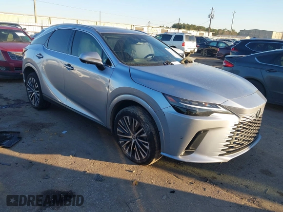2023 Lexus RX with VIN JTJCHMAA1P2000203, listed as a IAAI auction lot 41409470 with 1 mi miles. Bid and sale history available at carsss.com. Image 1.