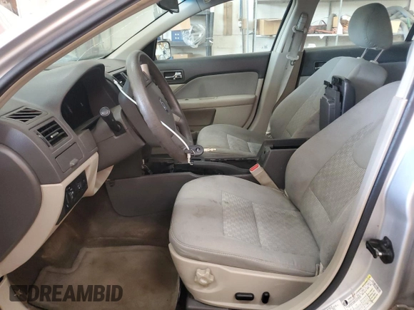 2012 Ford Fusion SE with VIN 3FAHP0HA0CR357541, listed as a Copart auction lot 63001985 with 249,794 mi miles and Clean title. Bid and sale history available at DreamBid. Image 7.