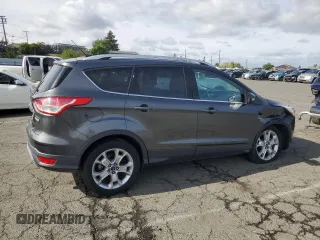 2015 Ford Escape Titanium with VIN 1FMCU0J98FUA46879, listed as a Copart auction lot 51173555 with 72,093 mi miles and Salvage Title. Bid and sale history available at DreamBid. Image 3.