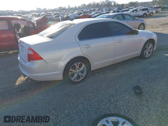 2012 Ford Fusion SE with VIN 3FAHP0HAXCR179699, listed as a IAAI auction lot 41009969 with 167,120 mi miles. Bid and sale history available at carsss.com. Image 4.