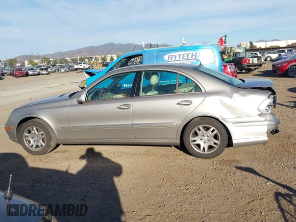 2005 Mercedes-Benz E-Class 3.2L with VIN WDBUF65J05A646577, listed as a IAAI auction lot 41666861 with 106,012 mi miles. Bid and sale history available at carsss.com. Image 14.