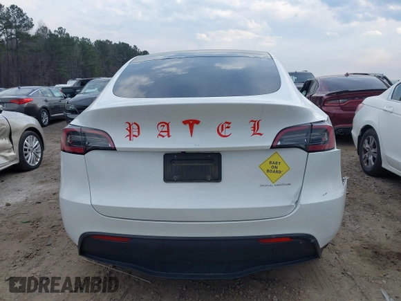 2023 Tesla Model Y Long Range with VIN 7SAYGDEE2PF765395, listed as a IAAI auction lot 41688080 with 27,792 mi miles and . Bid and sale history available at DreamBid. Image 16.