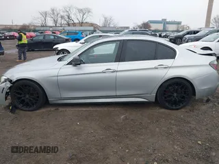 2018 BMW 3 Series 330i xDrive with VIN WBA8D9C55JA607605, listed as a IAAI auction lot 41682994 with 79,285 mi miles and . Bid and sale history available at DreamBid. Image 14.