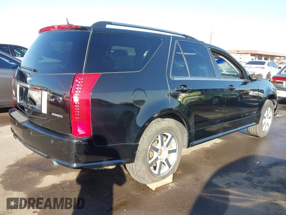 2005 Cadillac SRX with VIN 1GYEE63A150118834, listed as a IAAI auction lot 41503590 with 194,939 mi miles. Bid and sale history available at carsss.com. Image 4.