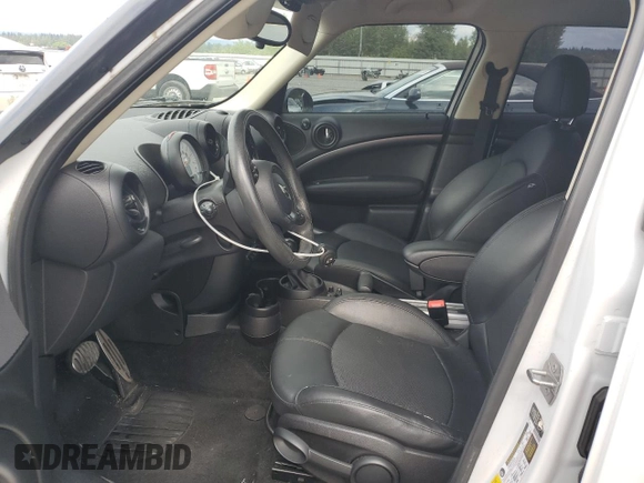 2013 MINI Countryman S with VIN WMWZC3C57DWP23397, listed as a Copart auction lot 61419665 with 139,838 mi miles and Salvage title. Bid and sale history available at DreamBid. Image 7.