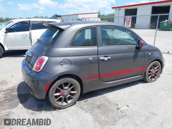 2015 FIAT 500 Abarth with VIN 3C3CFFFH2FT507879, listed as a IAAI auction lot 42135649 with 163,663 mi miles. Bid and sale history available at carsss.com. Image 4.